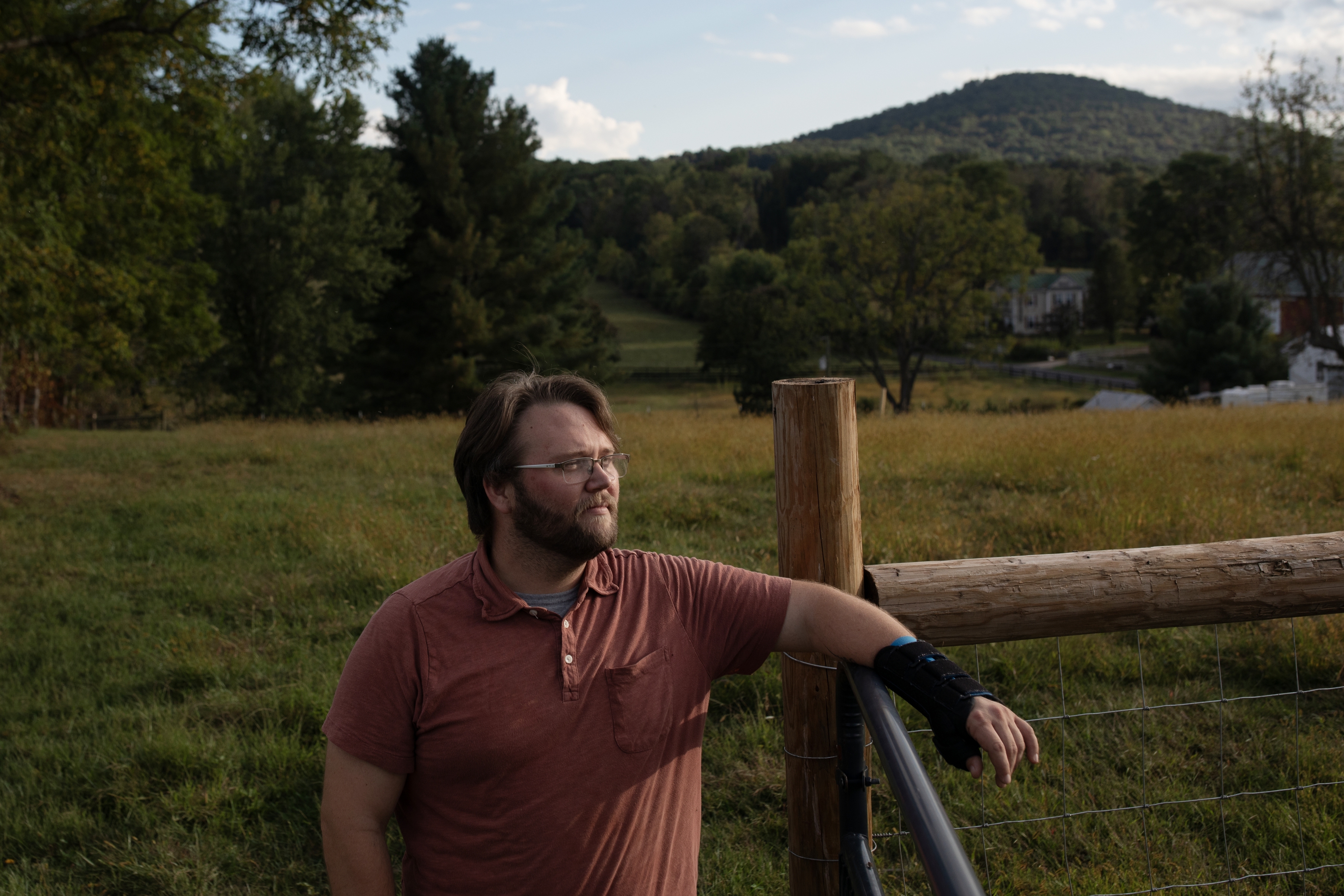 Andrew Tait, 36, works at a factory and lives with his partner and their daughters on a small farm in rural Virginia. He worries about inflated prices and is concerned about their family
